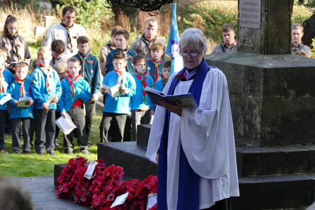 Janet Clarke leads the Remembrance Sunday service, which started outside St Peters Church in Curdridge