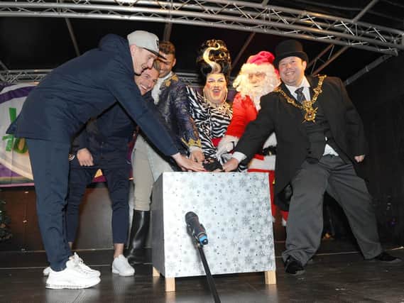 Portsmouth FC players Ronan Curtis and Craig MacGillivray, Jake Quickenden, Jack Edwards, Father Christmas and The Lord Mayor of Portsmouth Lee Mason.