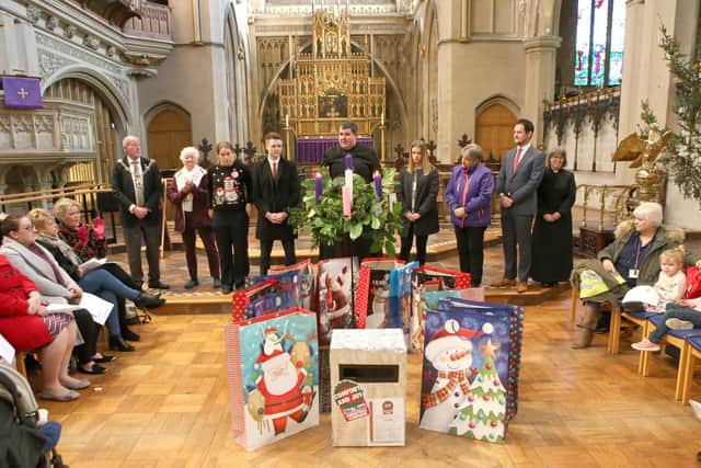 Bags of gift cards being handed out at last year's Comfort and Joy Christmas Campaign ceremony in St Mary's Church, Fratton.
Picture : Habibur Rahman