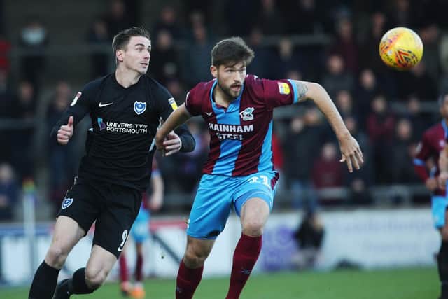 Oli Hawkins challenges for the ball. Pictures: Joe Pepler