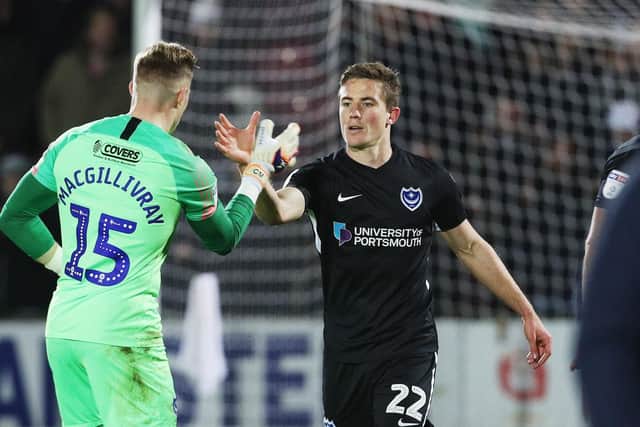 Craig MacGillivray and David Wheeler celebrate Pompey ending their Scunthorpe hoodoo. Picture: Joe Pepler