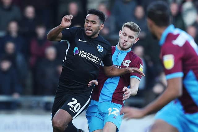 Nathan Thompson battles away as Pompey hold off Scunthorpe to win 2-1. Picture: Joe Pepler