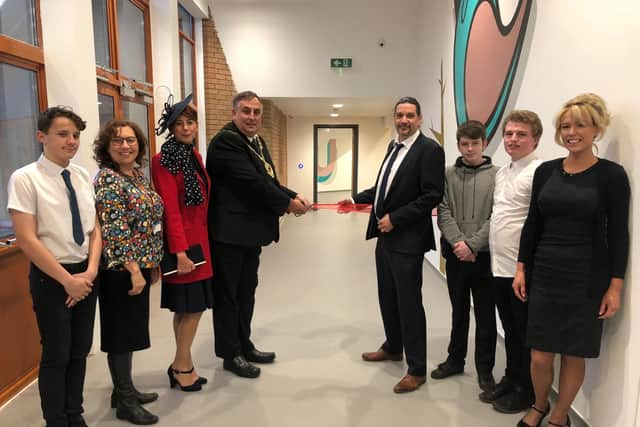 Pupil Josh Houghton, Councillor Suzy Horton, Deputy Lady Mayoress Leza Tremorin, Deputy Lord Mayor Cllr David Fuller, headteacher Ian Hunkin, pupils Todd Ferguson and Brandon Clarke, and assistant headteacher Kim Budd