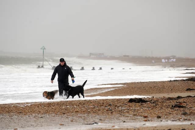 Heavy rain and blustery conditions will continue in Portsmouth over coming days. Picture: Allan Hutchings