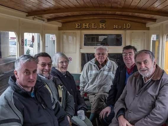 Tony Higham is situated at the back, and pictured in 2013 inside a Hayling Seaside Railway carriage with from Tony French, Bob Huxtable, Ann Griffiths, Ian Edwards and Jim Loe. Picture: Peter Drury