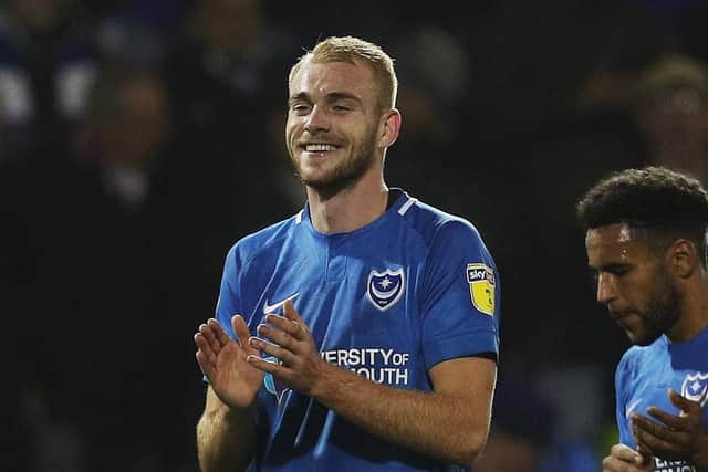 Jack Whatmough celebrates Pompey's win over Walsall. Picture: Joe Pepler