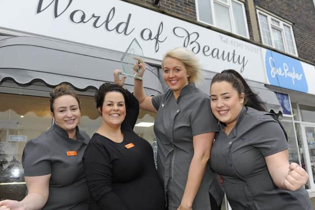 Staff at World of Beauty in Lee-on-Solent celebrate after winning the News salon of the year competition Serena Mellish holds the award with (l to r),  Donna Edwards, Michelle Farmer, Jane Buttriss. Picture Ian Hargreaves