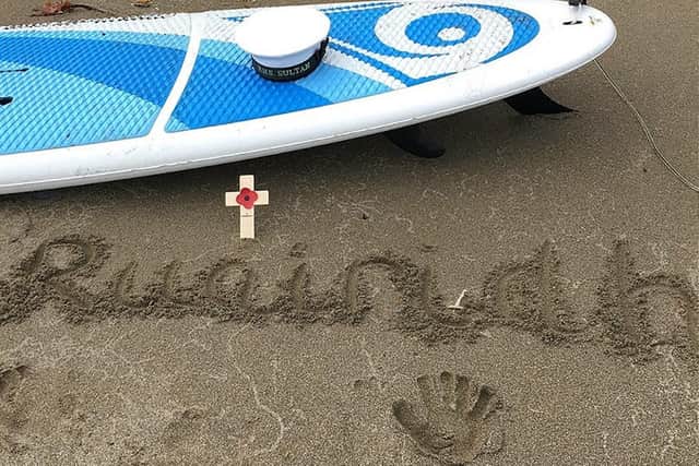 The tribute was paid by Robbie to his son after completing his paddleboarding charity event