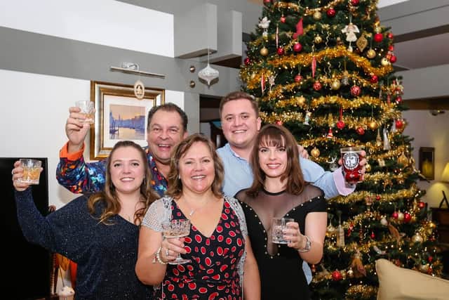 Last Christmas. The Beresfords say goodbye to their home of 12 years, which they are raffling (l-r) Amelia, Mark, Sharon, Max and Amelia