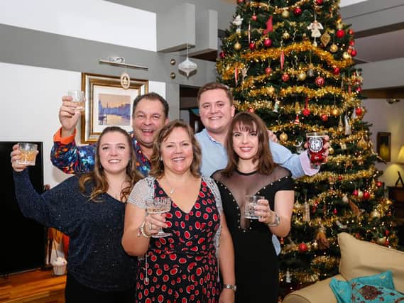 Last Christmas. The Beresfords say goodbye to their home of 12 years, which they are raffling (l-r) Amelia, Mark, Sharon, Max and Amelia