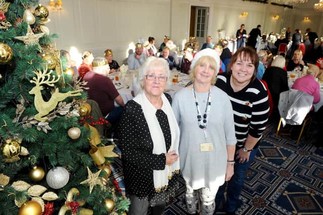 The Fellowship held a special Christmas themed lunch at The Queens Hotel in Southsea at the beginning of December. Pictured is: (l-r) Thelma Turner-Hill, organiser of The Fellowship with Sally Rumfitt and Katy Walsh. Picture: Sarah Standing