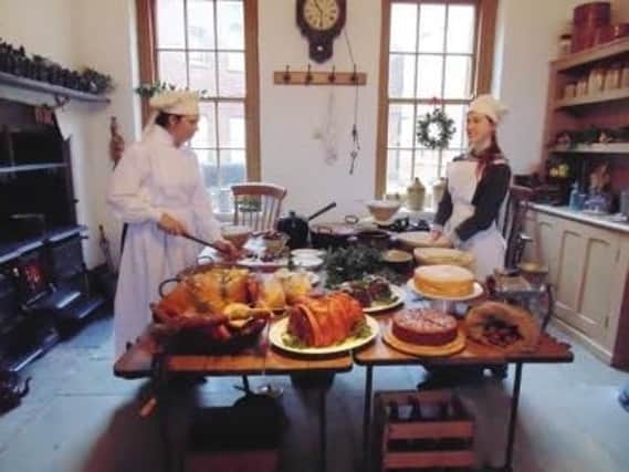 Actors in Fort Nelson's kitchen