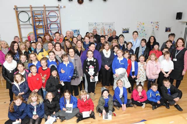 People at the candle-lit carol concert at Gomer Junior School, Gosport. Picture: Habibur Rahman