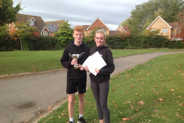 Vigilant House team captains Jack Mardell and Maisie Pannell receive the Bonding Day Trophy