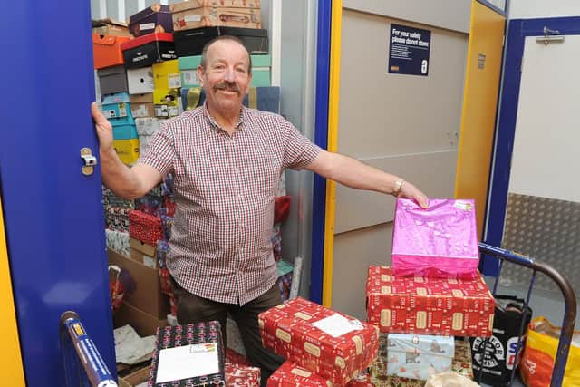 18/12/18  CATCH LINE: Homeless ChristmasSTORY:  Bill Shannon collects gifts and presents for the homeless at Christmas from a network of people across the area. He's had far more this year than in previous years and would like to say thanks to everyone who has helped. Pictured : Bill Shanon with the gifts at Safestore, Fratton Way,Portsmouth.Picture : Habibur Rahman