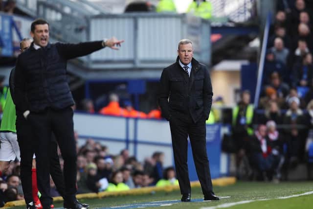 Pompey boss Kenny Jackett on the sideline with Jack Ross