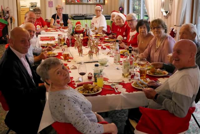 Retirement home residents at Harrison House with their Christmas lunch. Picture: Ray Peacock