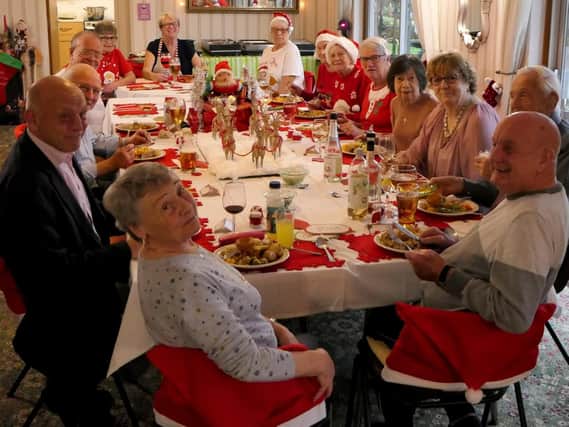 Retirement home residents at Harrison House with their Christmas lunch. Picture: Ray Peacock