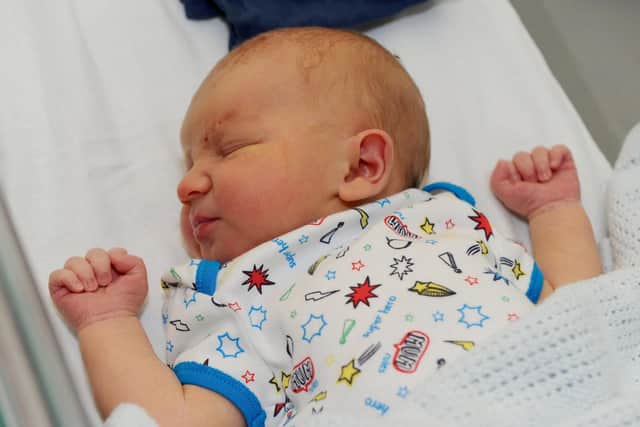 Xander Ellery was born at 3.01am on Christmas Day weighing a healthy 8lb 10oz 
Picture: Sarah Standing (180887-4486)