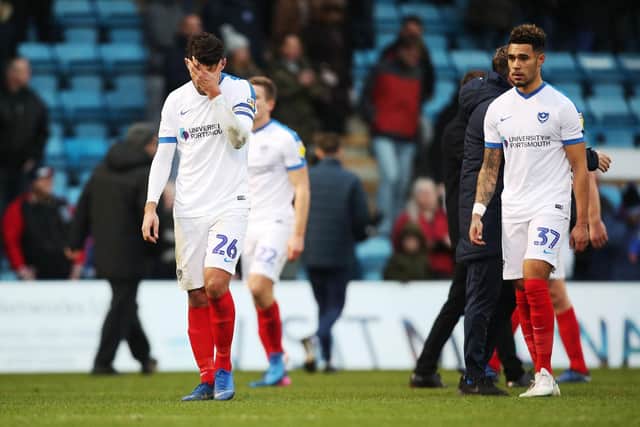 Gareth Evans dejected after Pompey's first away loss of the season. Picture: Joe Pepler