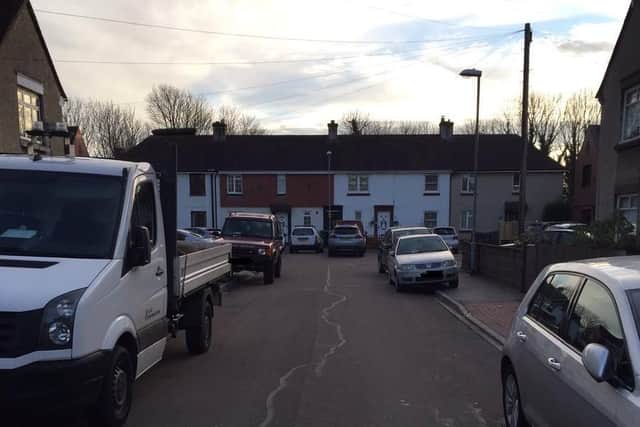 Parked vehicles on both sides of Colwell Road stopped fire engines reaching their destination