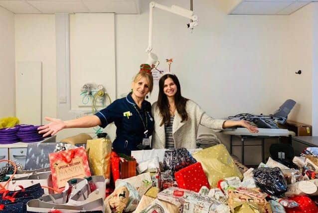 Sandy and daughter Shannen Dewis collected presents as part of their annual appeal. Sandy is a sister on the orthopaedics ward and delivered presents to the D4 ward