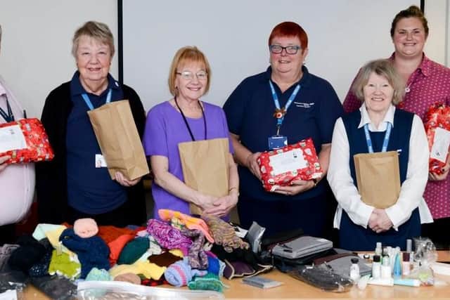 Staff and volunteers from the hospital's rheumatology department collected, donated and wrapped gifts for the homeless, and patients of theirs in need