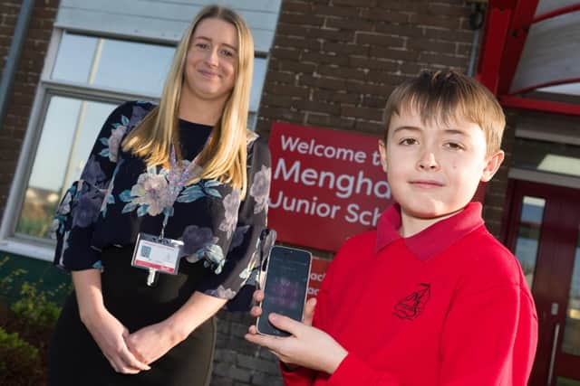 Year 6 pupil Hayden Goodright, 11, alongside his proud teacher Chloe Rowsell. Picture: Duncan Shepherd