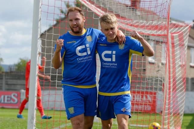 Sam Smart, right, celebrates scoring for Basingstoke. Picture: Steve Gridley