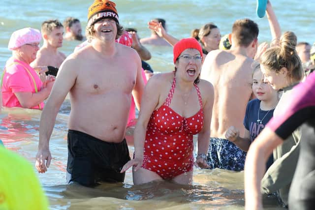 The annual GAFIRS New Year's Day swim took place on Tuesday, January 1 in Gosport. Picture: Sarah Standing (010119-20)