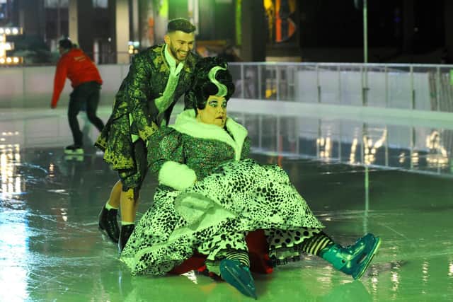 Jake Quickenden pushes Jack Edwards around the ice rink. Picture: Sarah Standing (180869-9639)