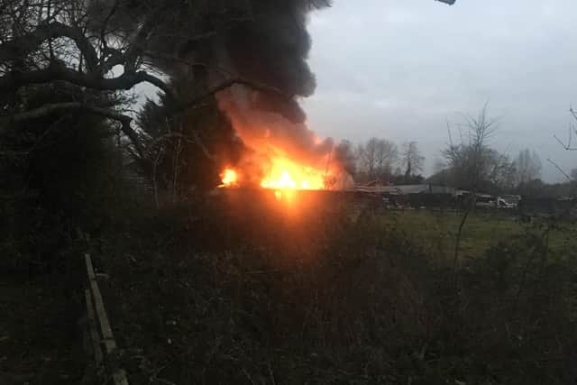 The fire seen from a couples garden after hearing the explosion.