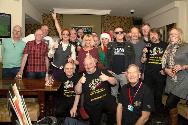 Volunteers from The Flash radio based in Leigh Park at their Christmas get-together at The Red Lion in Cosham. The team will help to bring a community service to Waterlooville.