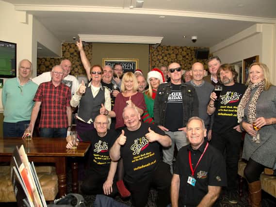 Volunteers from The Flash radio based in Leigh Park at their Christmas get-together at The Red Lion in Cosham. The team will help to bring a community service to Waterlooville.