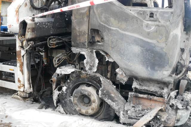 One of the heavy goods vehicles that were damaged. Picture: Habibur Rahman (030119)
