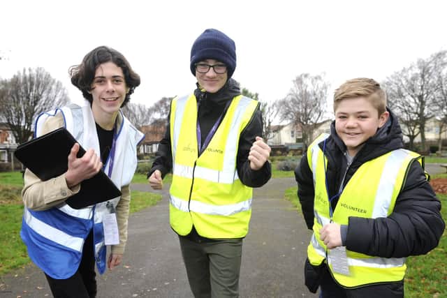 Eastney junior parkrun at Bransbury Park. Left to right: Volunteers Harvey Gosling, Jacques Mitchell and Thomas Fisher. Picture Ian Hargreaves (181230-1)