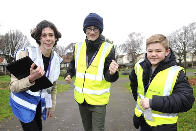 Eastney junior parkrun at Bransbury Park. Left to right: Volunteers Harvey Gosling, Jacques Mitchell and Thomas Fisher. Picture Ian Hargreaves (181230-1)