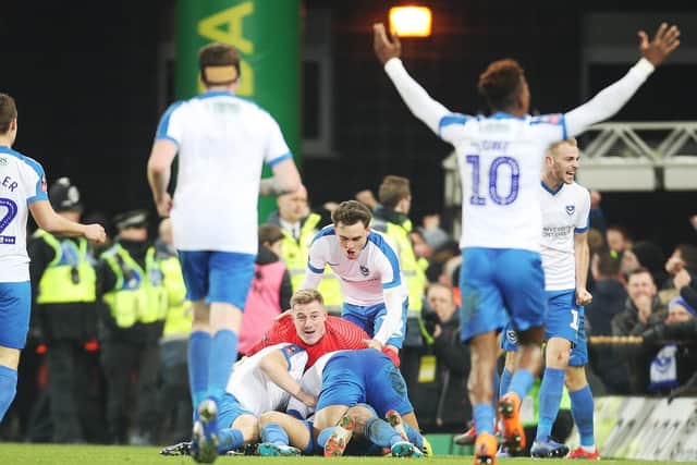 Pompey celebrate Andre Green's last minute winner against Norwich
