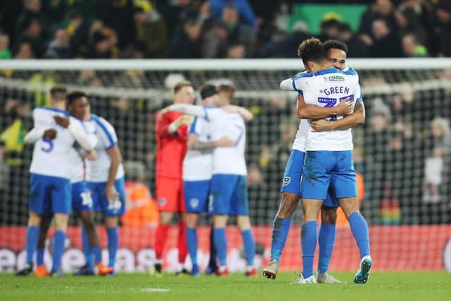 Pompey celebrate Andre Green's 94th-minute winner at Norwich. Picture: Joe Pepler