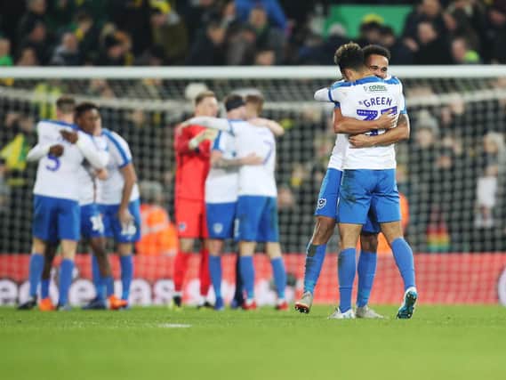 Pompey celebrate Andre Green's 94th-minute winner at Norwich. Picture: Joe Pepler
