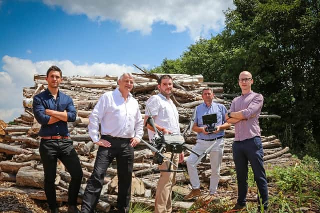 Thermal imaging company iRed with one of their drones. Ray Faulkner is second from left.