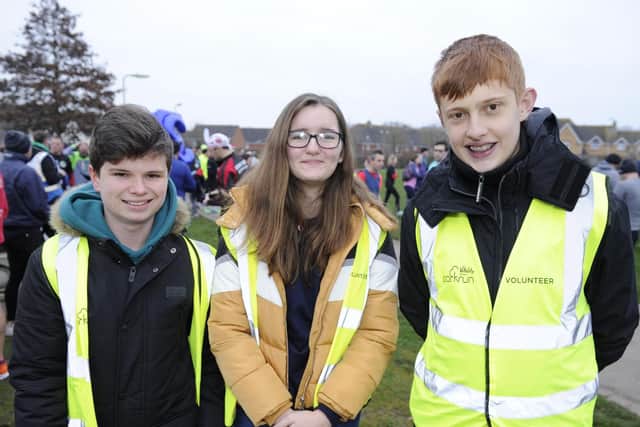 Whiteley parkrun volunteers Jack Rees, Holly Thwaites, and Franio Van Wyk. Picture: Ian Hargreaves (050119-6)