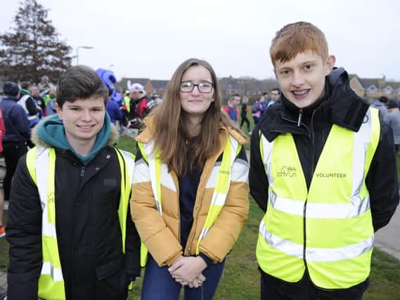 Whiteley parkrun volunteers Jack Rees, Holly Thwaites, and Franio Van Wyk. Picture: Ian Hargreaves  (050119-6)