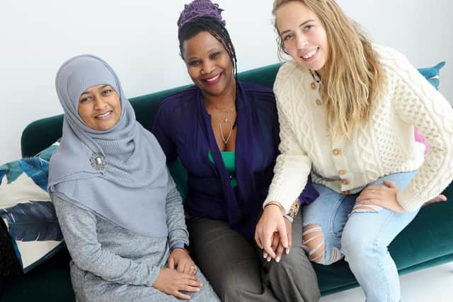 Roni Edwards, centre, is organising the Pamodzi Inspirational Women of Portsmouth Awards. Here she is with her 'trailblazers' and judges Rowshonara Reza, left, who works for Portsmouth City Council and Jennifer Sanchez, owner of Dimples and Daisies Photography. Picture: Sarah Standing (110119-5609)