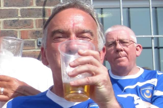 Pompey fanatic, Mark Webster, enjoying a pint before the game.