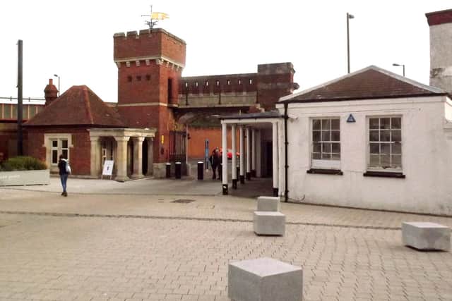 The former main gate to HMS Vernon is now the entrance to Gunwharf Quays. Note the new guardhouse on the right.