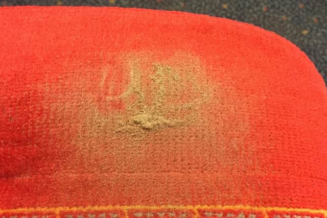 Paul believes the train seats have years of dirt in them. Picture: Paul Garrod