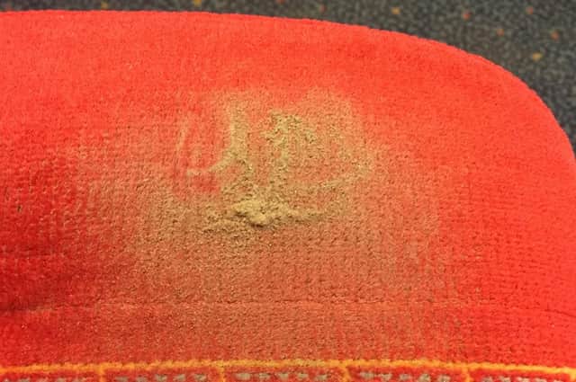 Paul believes the train seats have years of dirt in them. Picture: Paul Garrod
