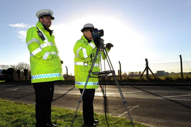 Checking the speed of traffic, Road safety constable Dave Mitchell and PC Liz Johnson. Picture: Habibur Rahman