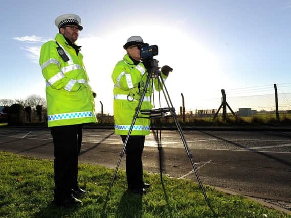 Checking the speed of traffic, Road safety constable Dave Mitchell and PC Liz Johnson. Picture: Habibur Rahman